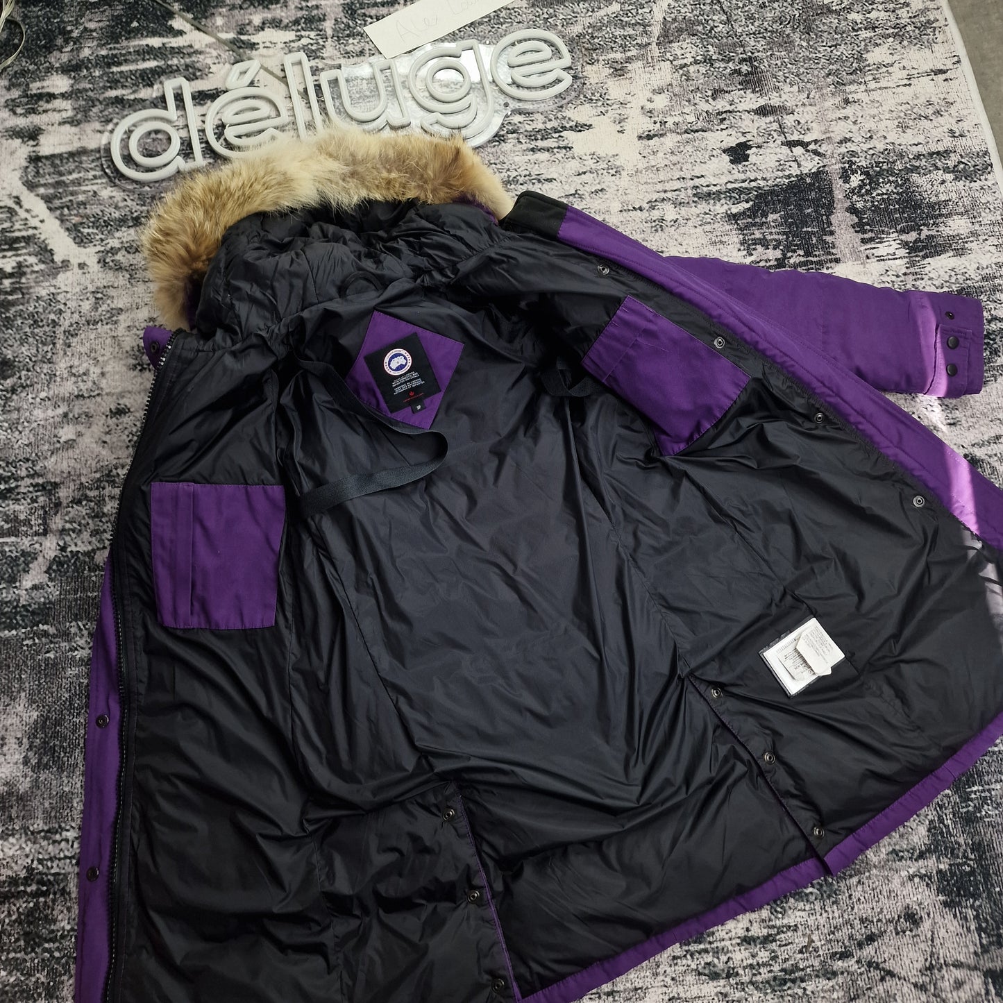 Interior lining view of Canada Goose Shelburne Parka 3802L showing inside pockets and quality construction, women's Purple Arctic Disk colorway luxury winter coat