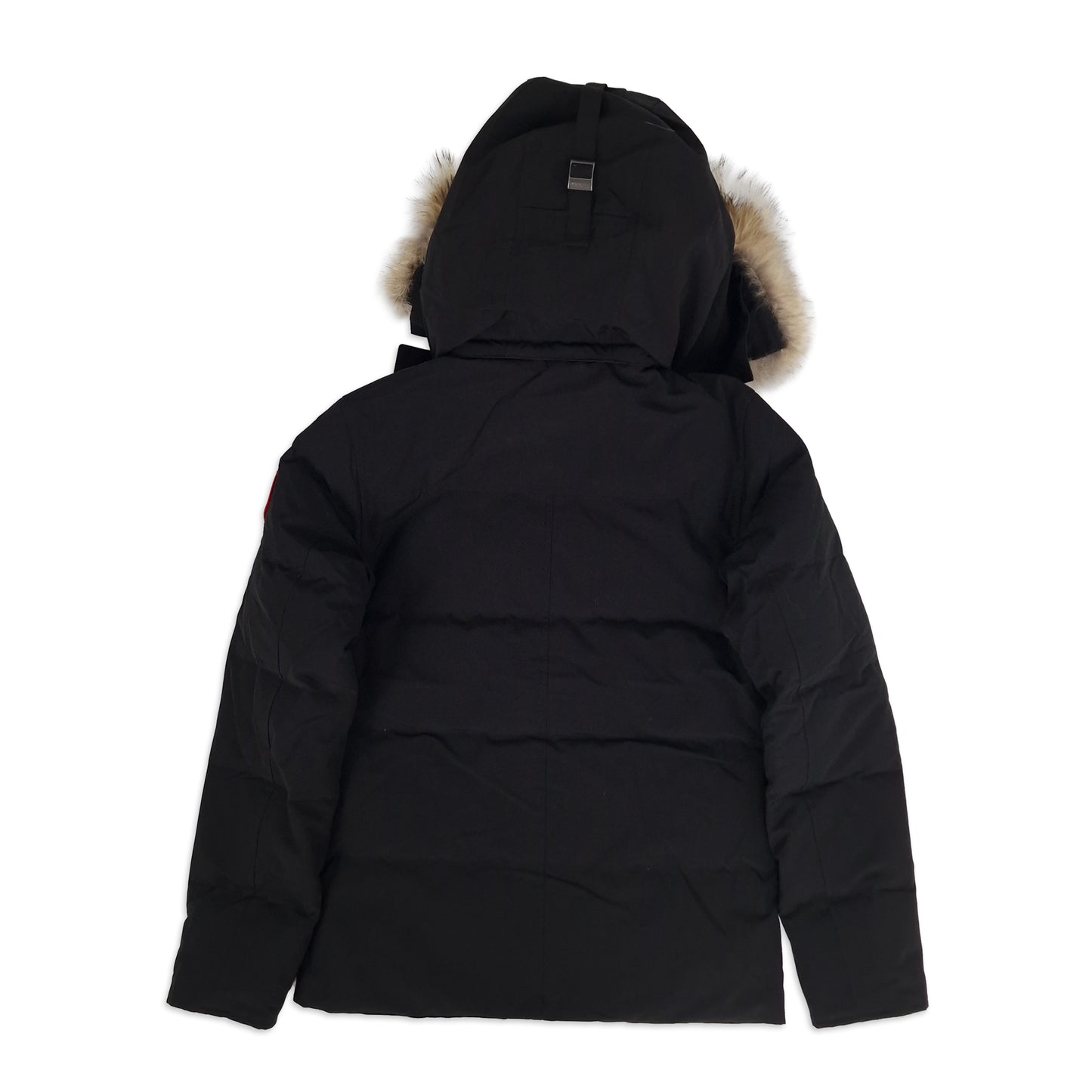 Back view of men's Canada Goose Wyndham Parka 3808MA XS in black showing signature Arctic Program patch and slim-fit silhouette, displayed on white background