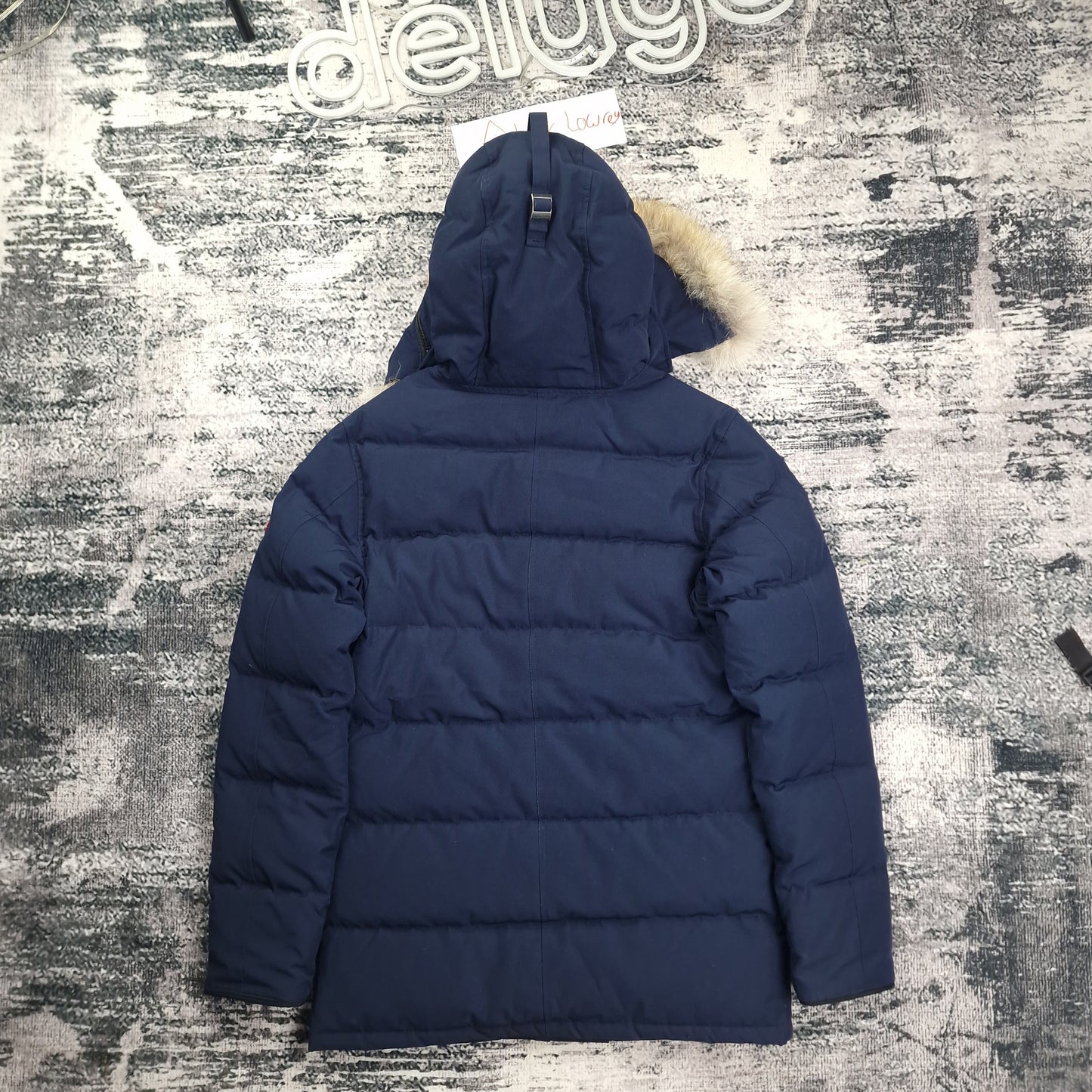 Back flat lay of Canada Goose Carson Parka 3805MA men's medium in Heritage Admiral Blue with fur-trimmed hood and thigh-length design