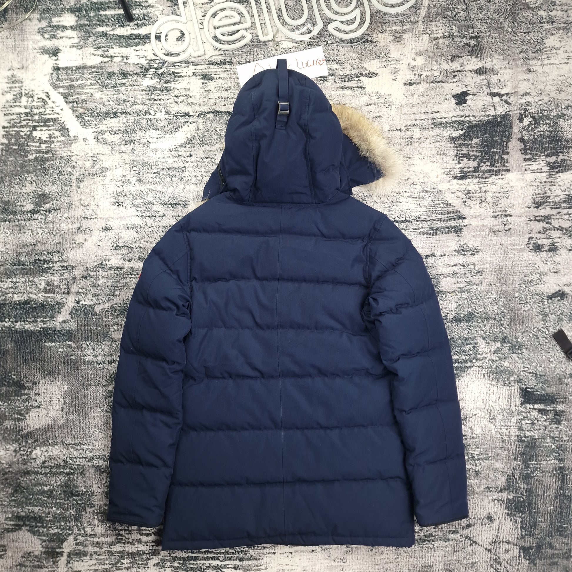 Back flat lay of Canada Goose Carson Parka 3805MA men's medium in Heritage Admiral Blue with fur-trimmed hood and thigh-length design