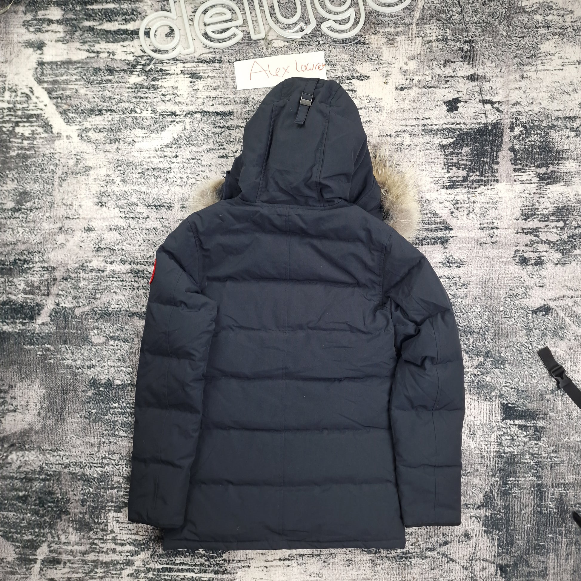 Back flat lay of Canada Goose Carson Parka 3805MA men's small showing coyote fur hood and Heritage Navy color