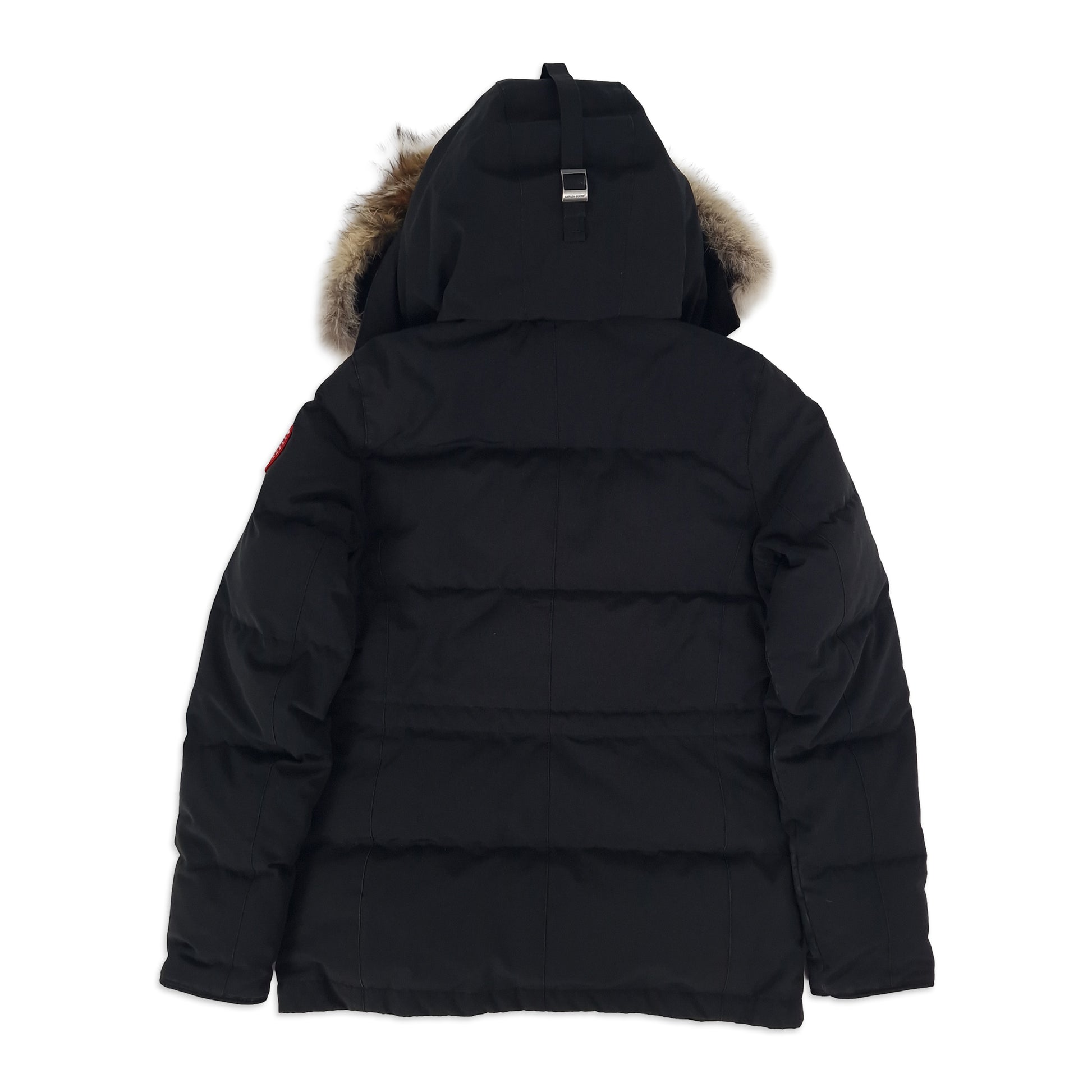 Rear view of black Canada Goose Chelsea Parka women's small 3804L showing fur-trimmed hood and quilted down insulation design
