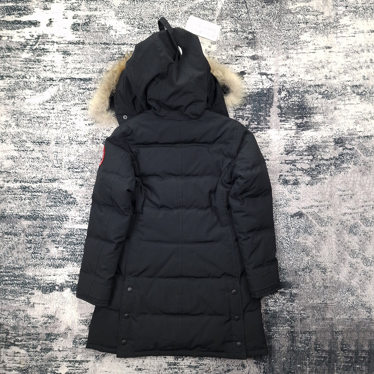Back flat lay of Canada Goose Shelburne Parka 3802L women's small showing fur-trimmed hood and button closure detail