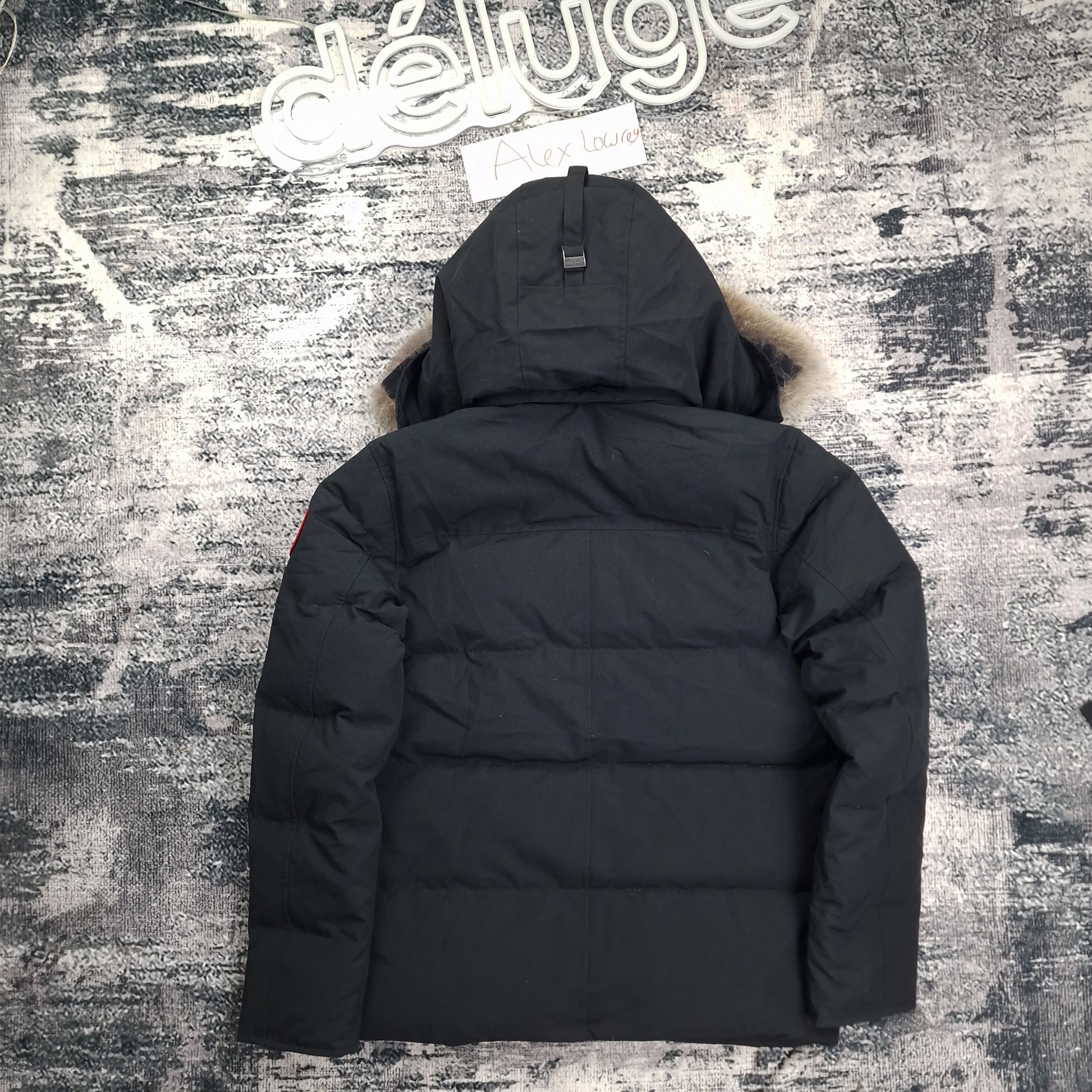 Back view of Canada Goose Wyndham Heritage parka style 3808MA, size large in black, displaying quilted design and luxurious fur-trimmed hood