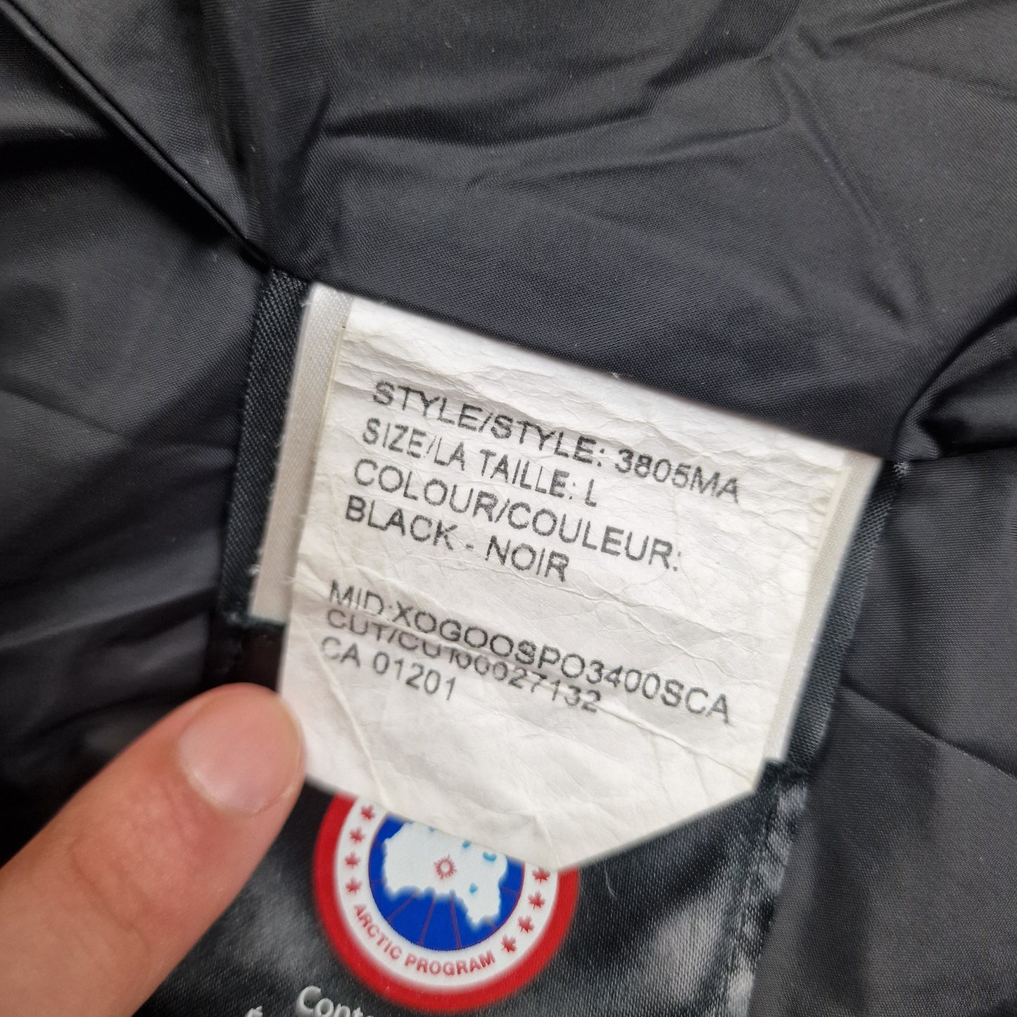 Canada Goose Carson Parka White Wash Tag Close-Up with Size Color and Style Code Details