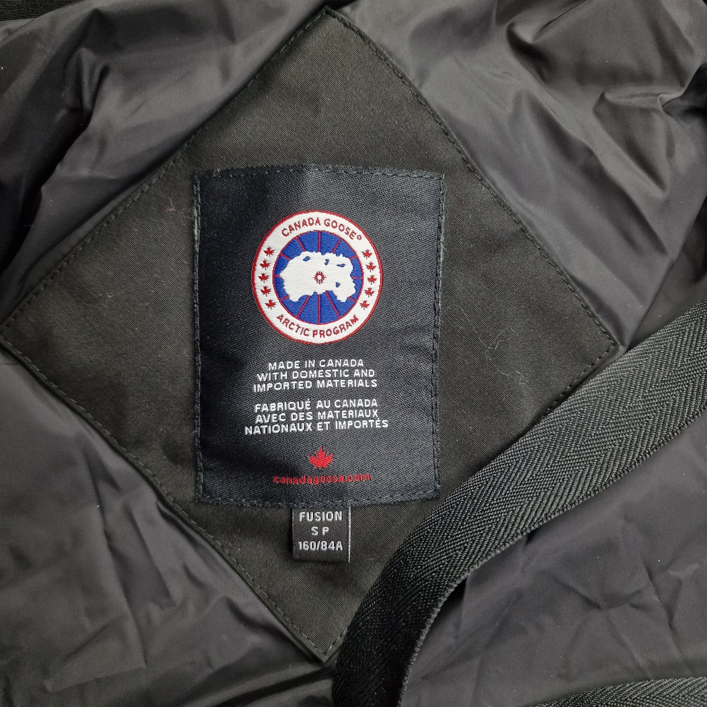 Canada Goose Chelsea Parka Neck Tag Close-Up Showing Size Label