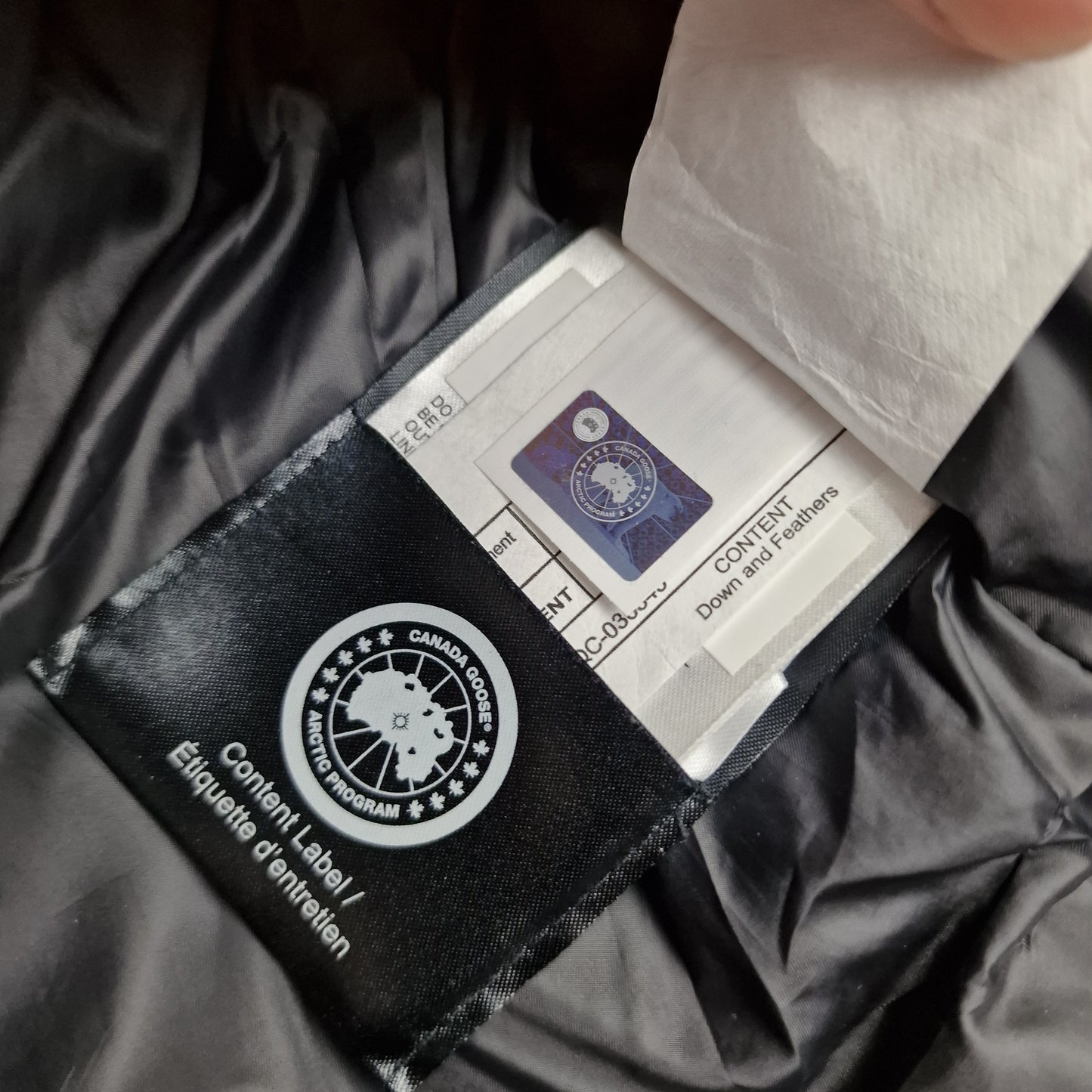 Canada Goose Authenticity Hologram Tag Close-Up on Maitland Parka Black Label