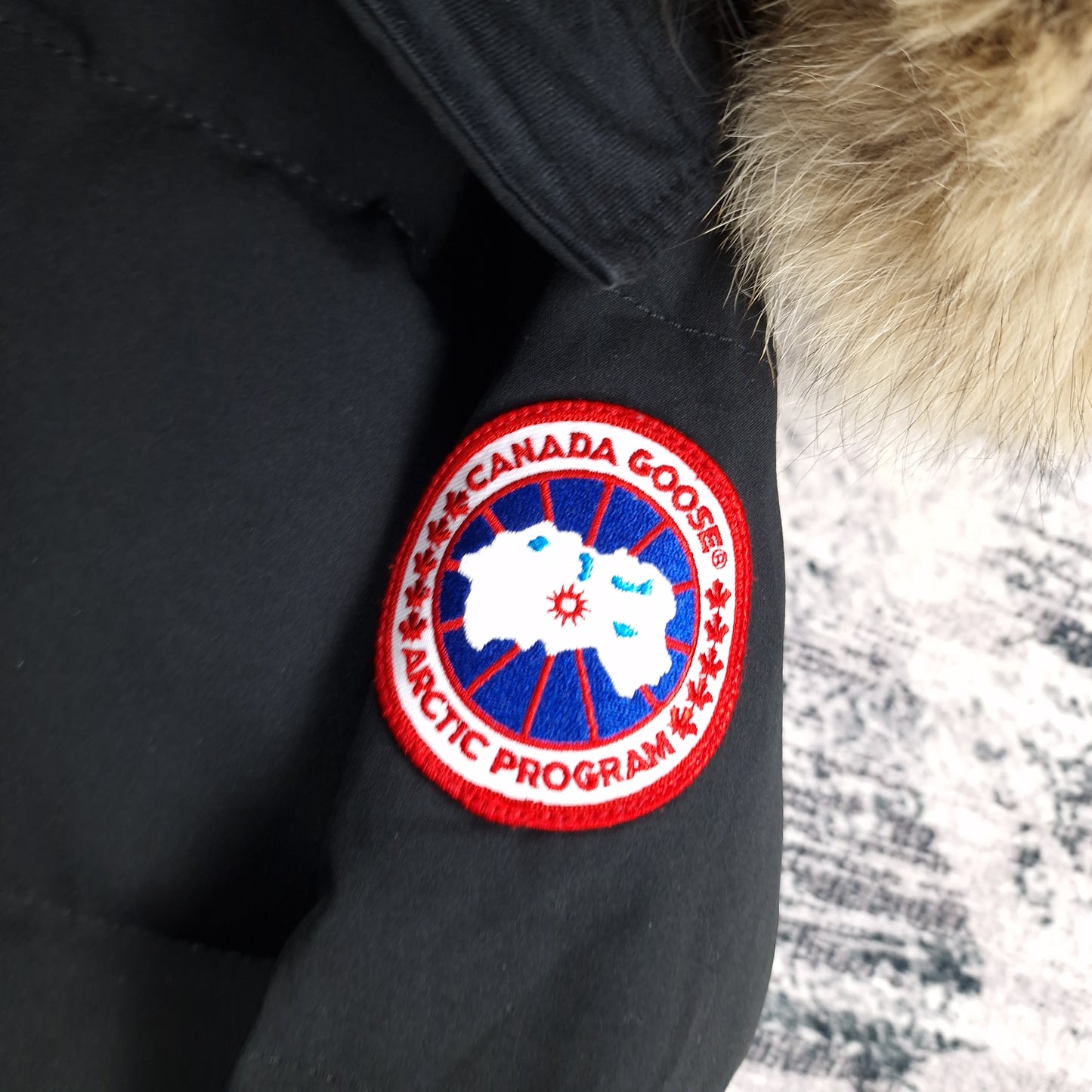 Canada Goose Badge Close-Up Detail on Black Portland Parka Women's