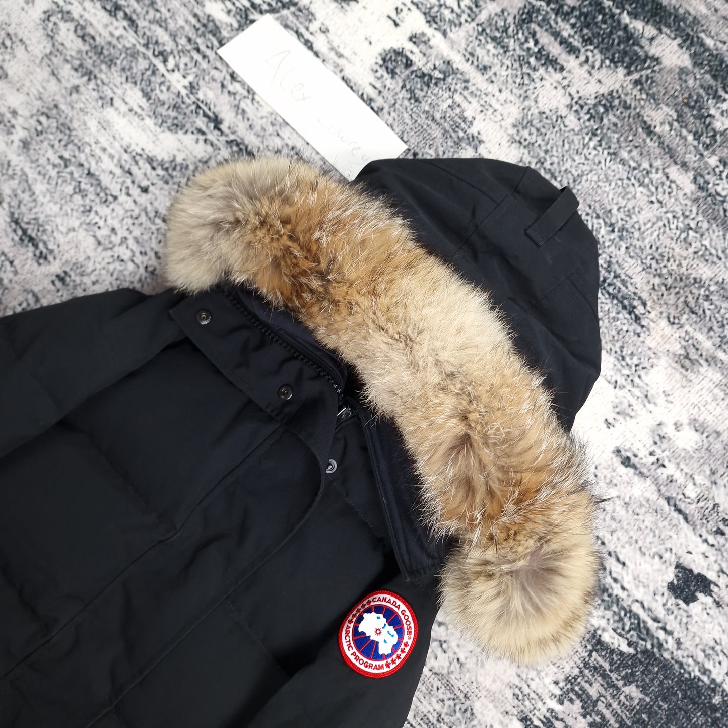 Canada Goose Portland Parka Black Women's Side View Close-Up Showing Fur Hood and Badge Detail