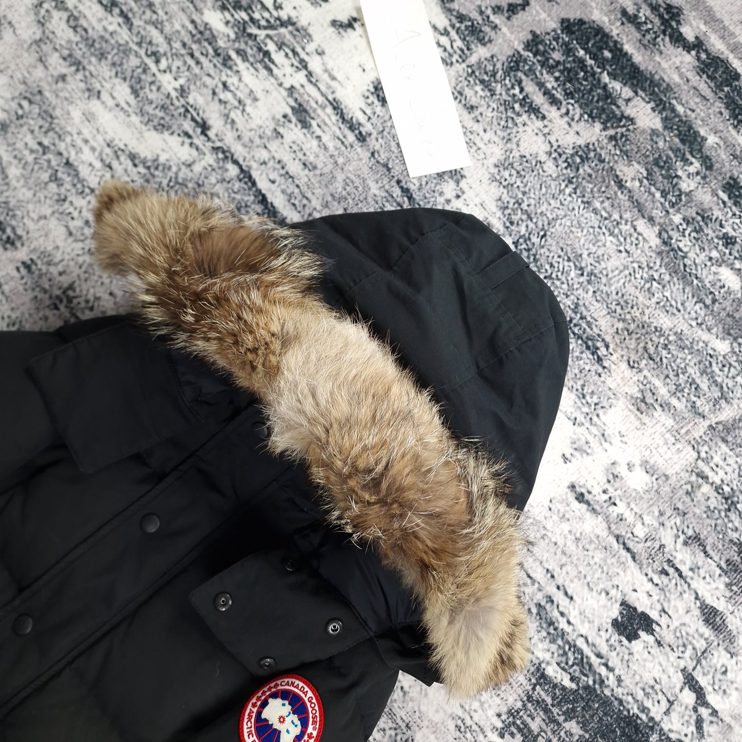 Canada Goose Wyndham Parka Black Men's Side View Showing Fur Hood and Badge Detail