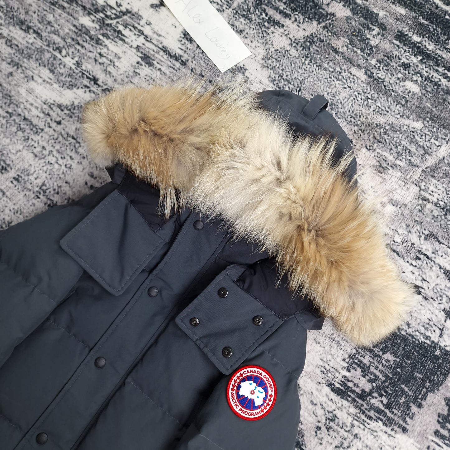 Canada Goose Wyndham Parka Graphite Men's Side View Showing Fur Hood and Badge Detail