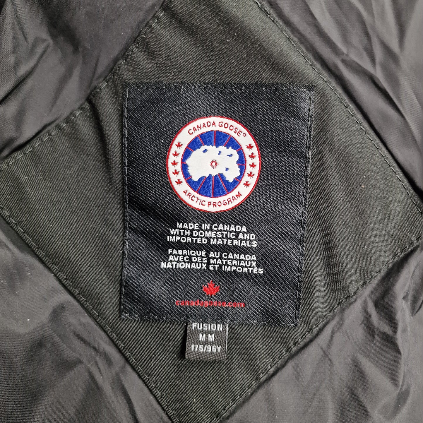 Canada Goose Wyndham Parka Heritage Neck Tag Close-Up Showing Size Label