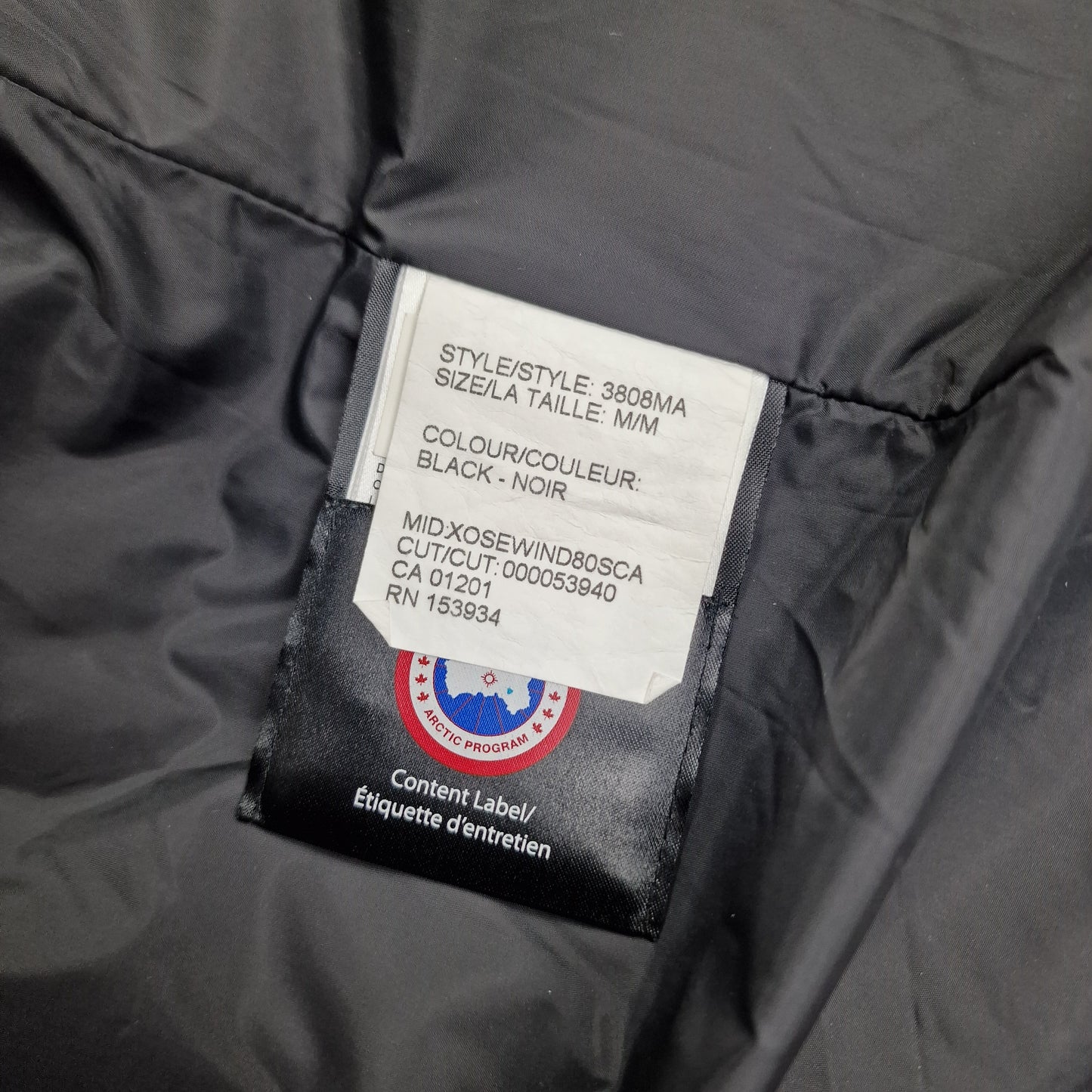 Canada Goose Wyndham Parka Heritage White Wash Tag Close-Up with Size Color and Style Code Details