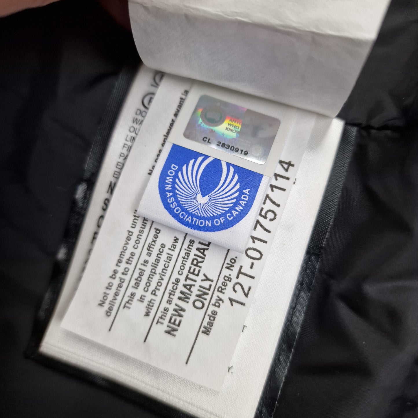 Canada Goose Authenticity Hologram Tag Close-Up on Wyndham Parka Heritage