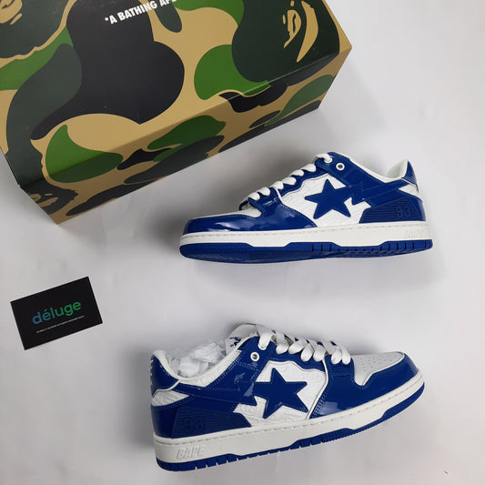 Side profile of A Bathing Ape Bapesta sneakers showing signature star logo, blue and white patent leather UK8