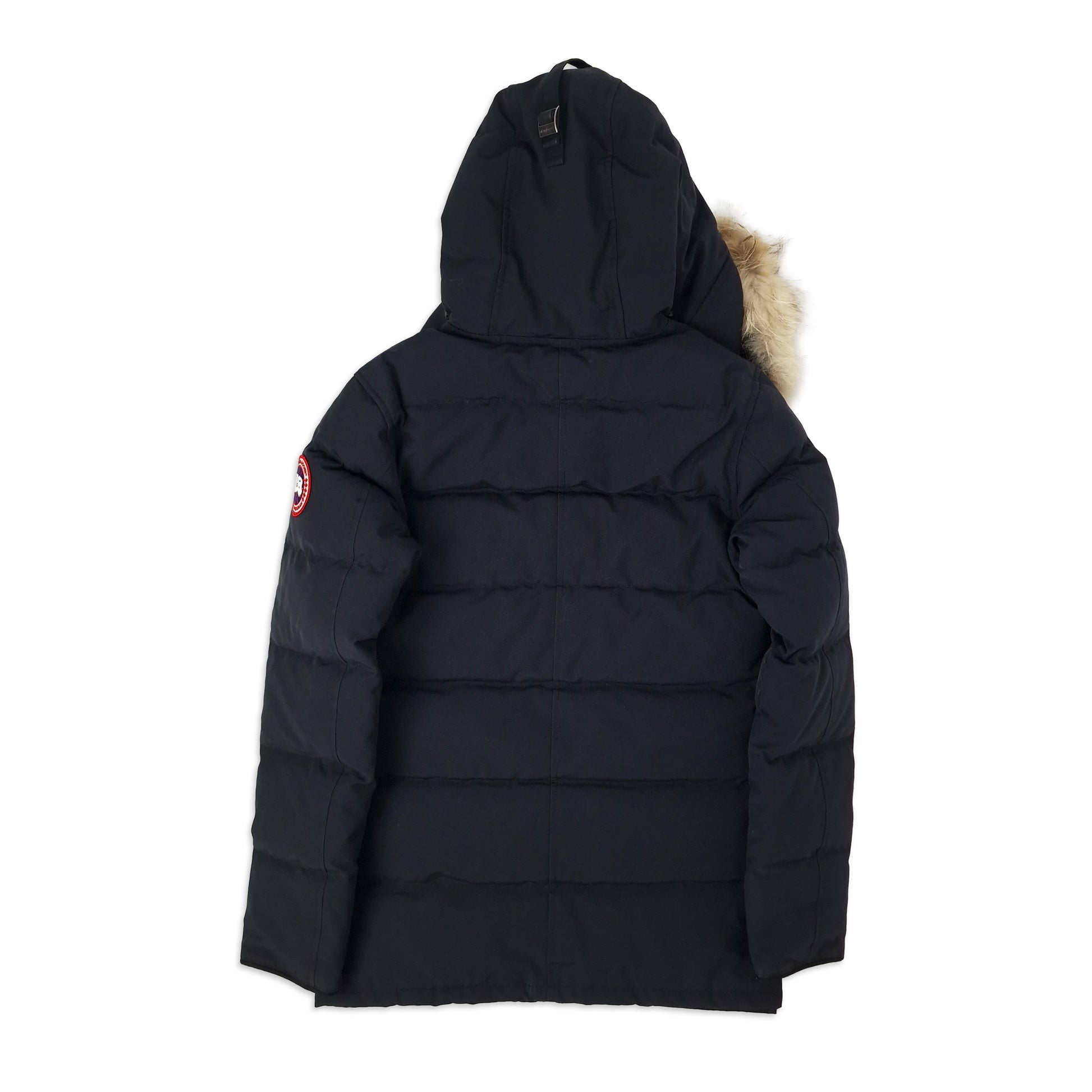 Back view of men's Canada Goose Carson Parka 3805MA Small in navy showing signature Arctic Program patch and hip-length cut, displayed on white background