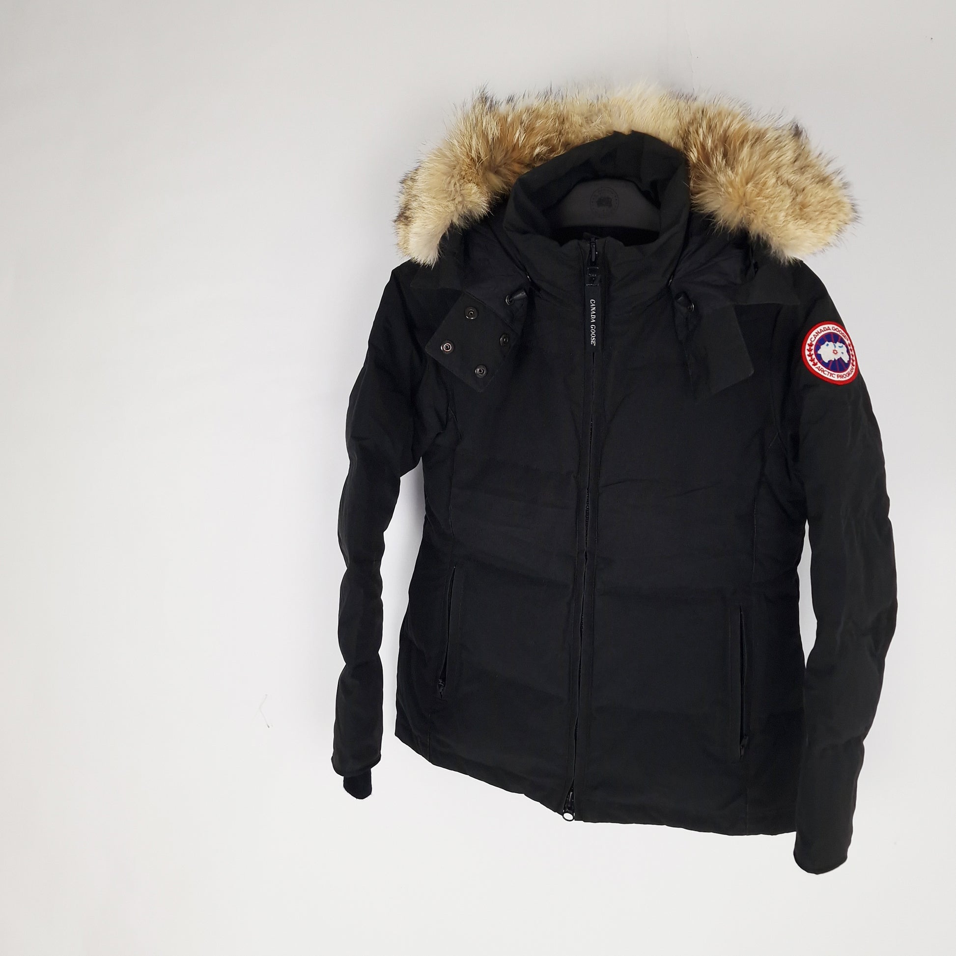Professional product photo of Canada Goose Chelsea Parka in black, women's luxury down-filled winter coat with fur hood, style 3804LA Medium, full jacket view