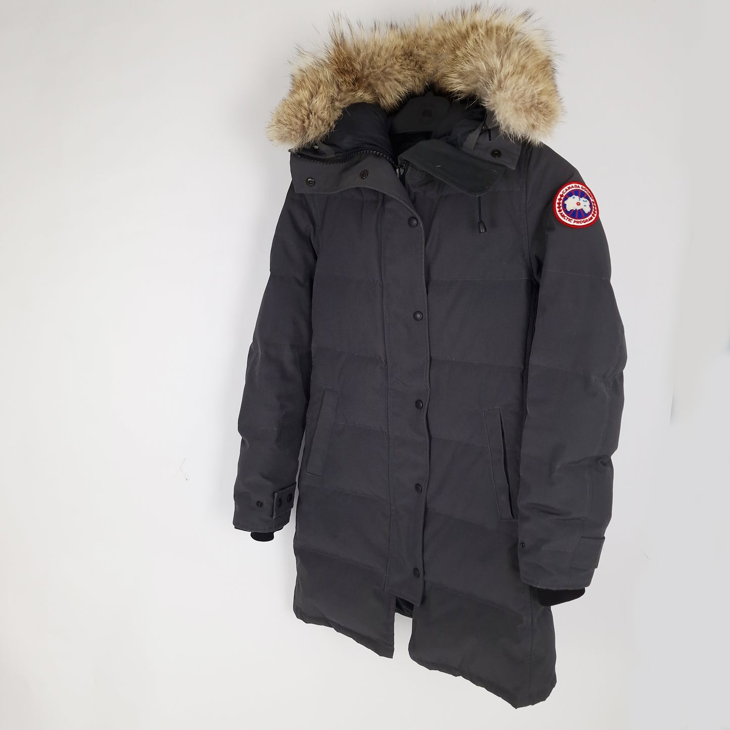 Professional product photo of Canada Goose Mackenzie Parka in Graphite grey, women's luxury down-filled winter coat similar to Shelburne Parka style, size Medium with fur hood