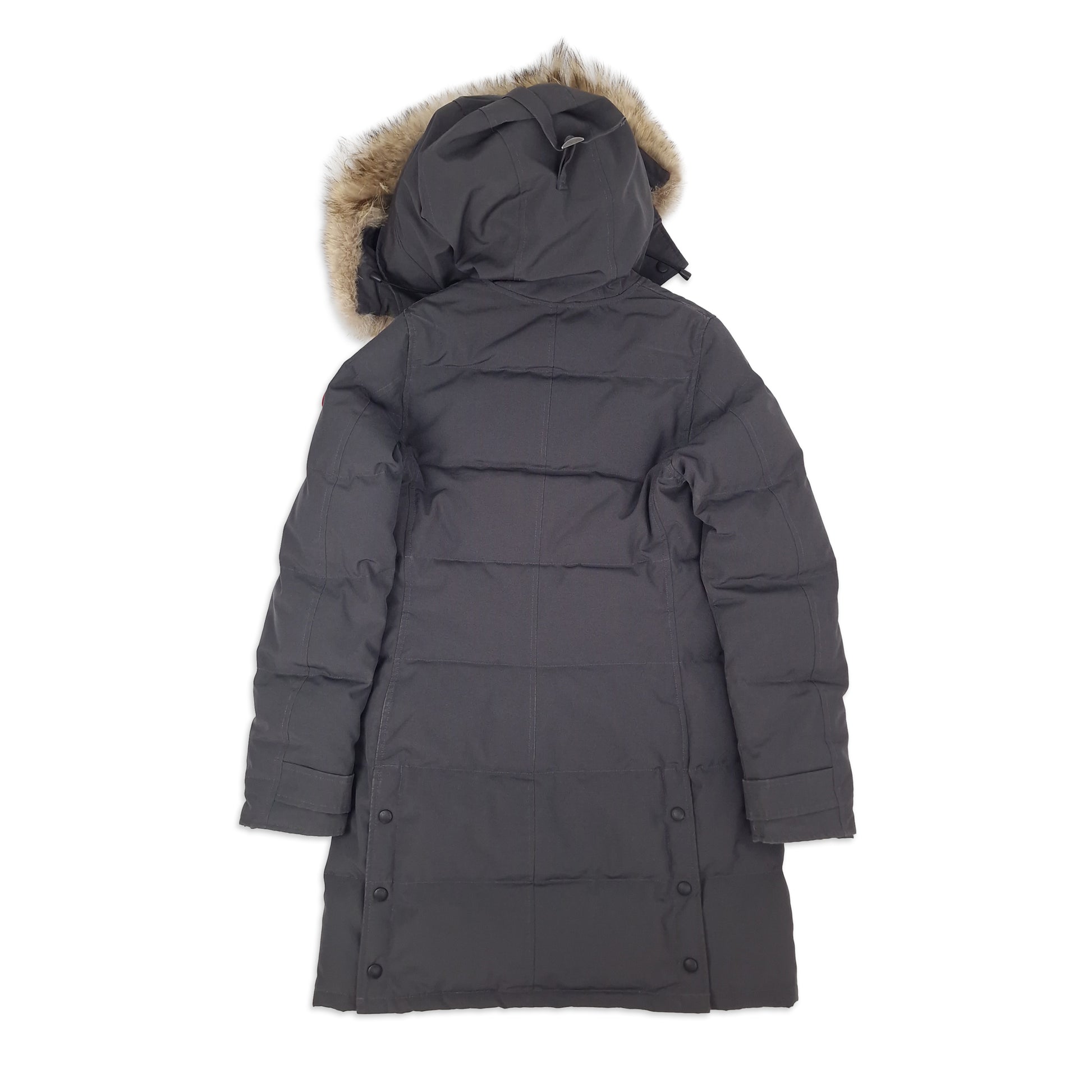 Back view of women's Canada Goose Mackenzie Parka Medium in Graphite grey showing Arctic Program patch, Shelburne-style silhouette, displayed on white background
