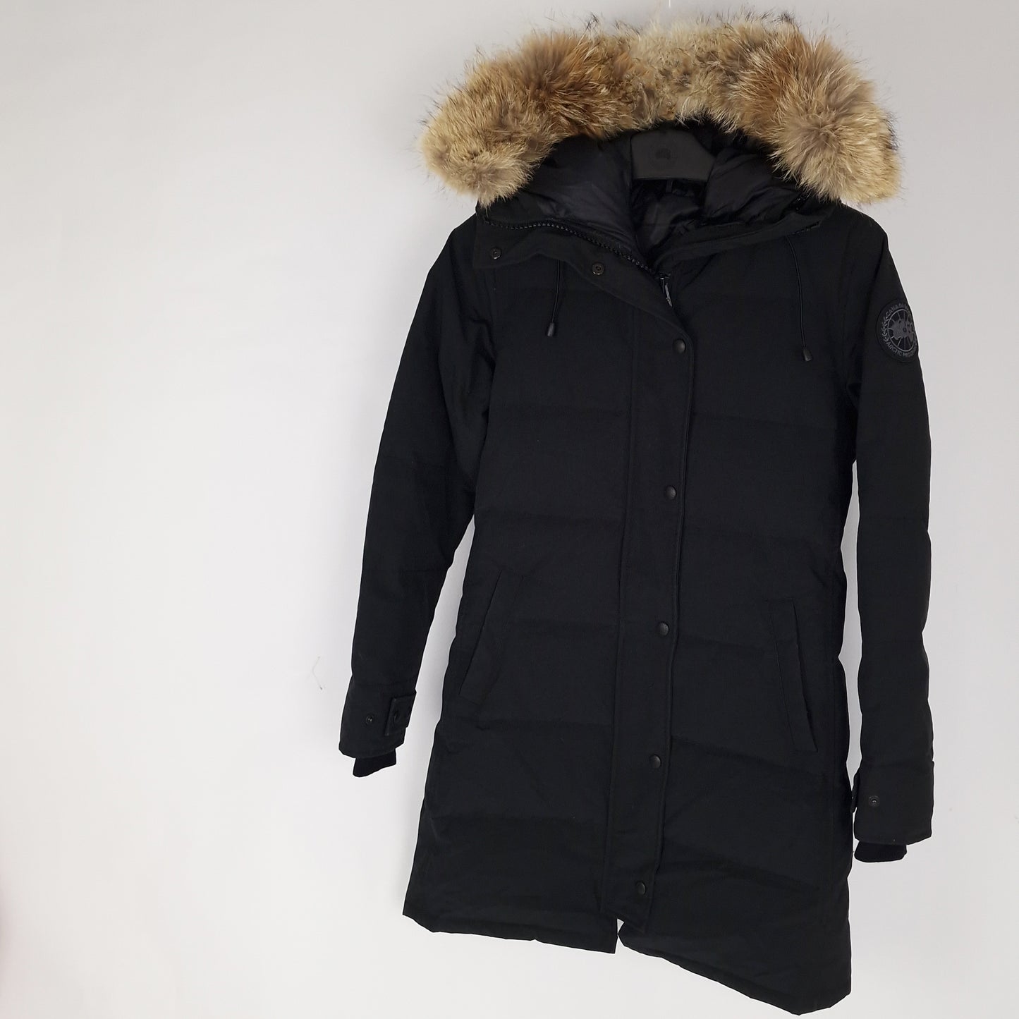 Professional product photo of Canada Goose Shelburne Parka Black Label in black, women's luxury down-filled winter coat with fur hood, style 3802LB Small, full jacket view