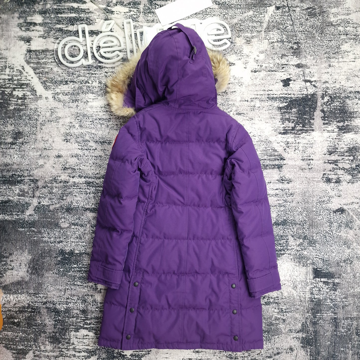 Back view of women's Canada Goose Shelburne Parka 3802L in rare Purple Arctic Disk colorway featuring Arctic Program patch, luxury winter coat photographed on styled background