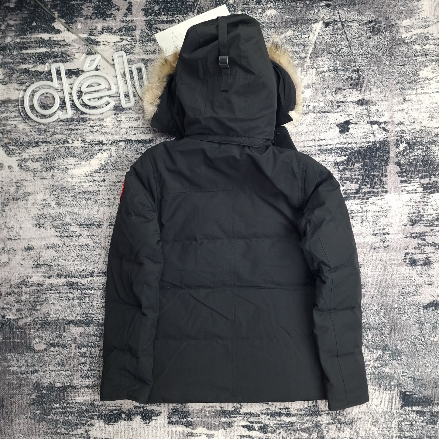 Back view of men's Canada Goose Wyndham Parka 3808MA XS in black featuring Arctic Program patch, slim-fit winter coat photographed on styled background