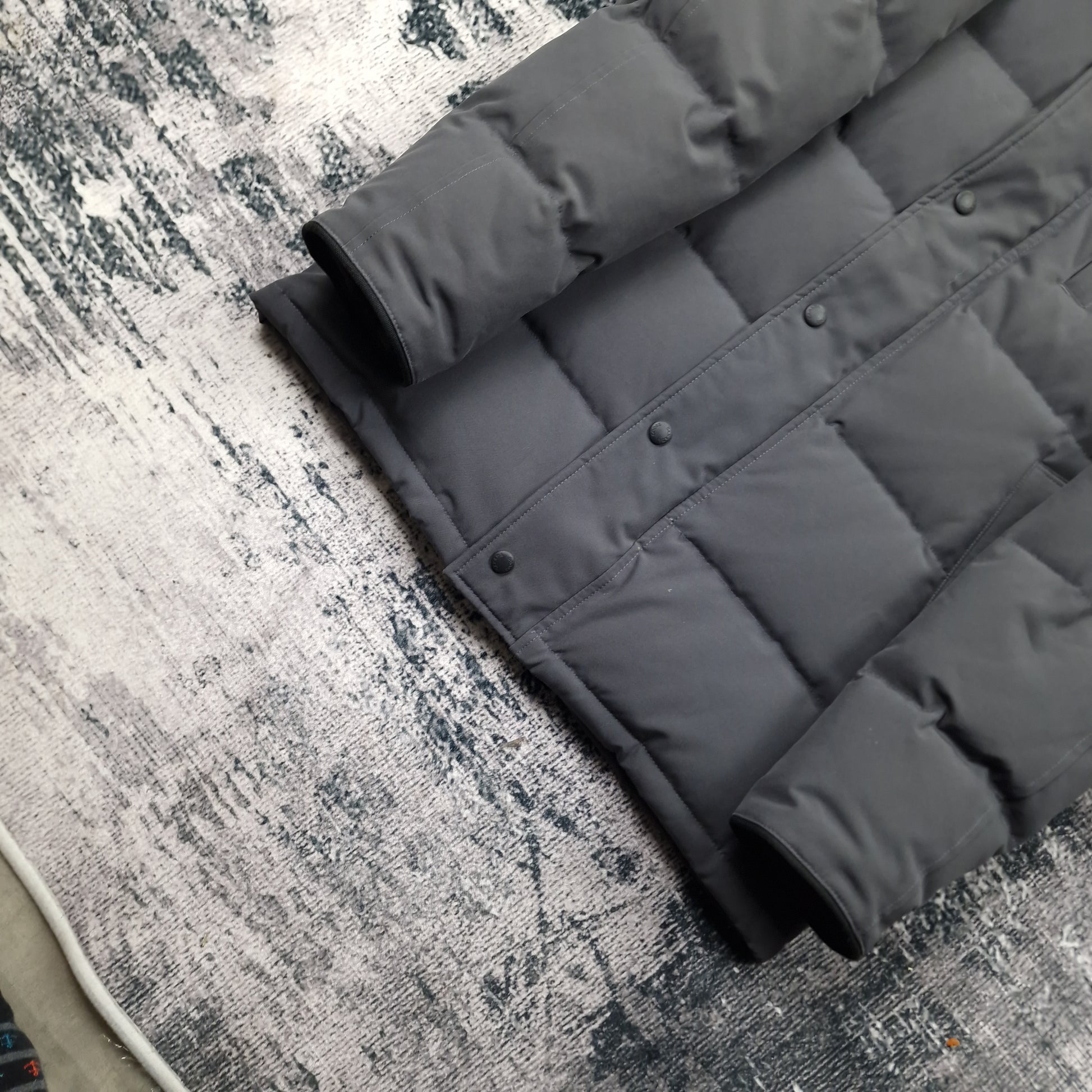 Close-up of ribbed knit cuffs on Canada Goose Wyndham Parka 3808MA XS in Graphite grey, showing quality construction details on men's luxury winter coat