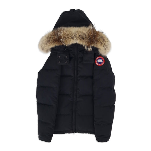 Front view of black Canada Goose Chelsea Parka 3804L women's size small featuring coyote fur hood, Arctic badge, and mid-length cut
