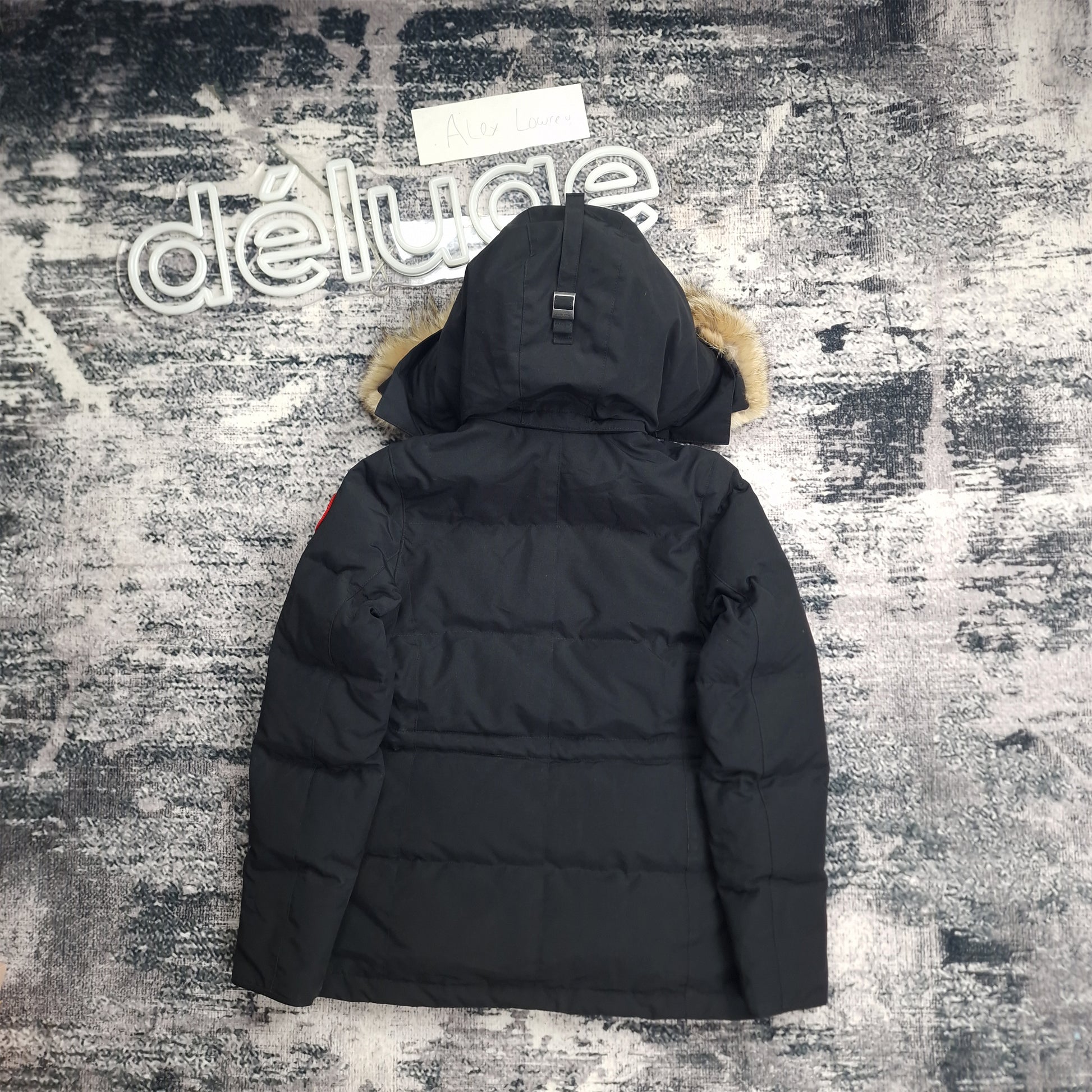 Canada Goose Chelsea Parka Black XS Women's back view. See the sleek silhouette and signature Arctic disc logo. Premium winter coat design. Shop authentic.