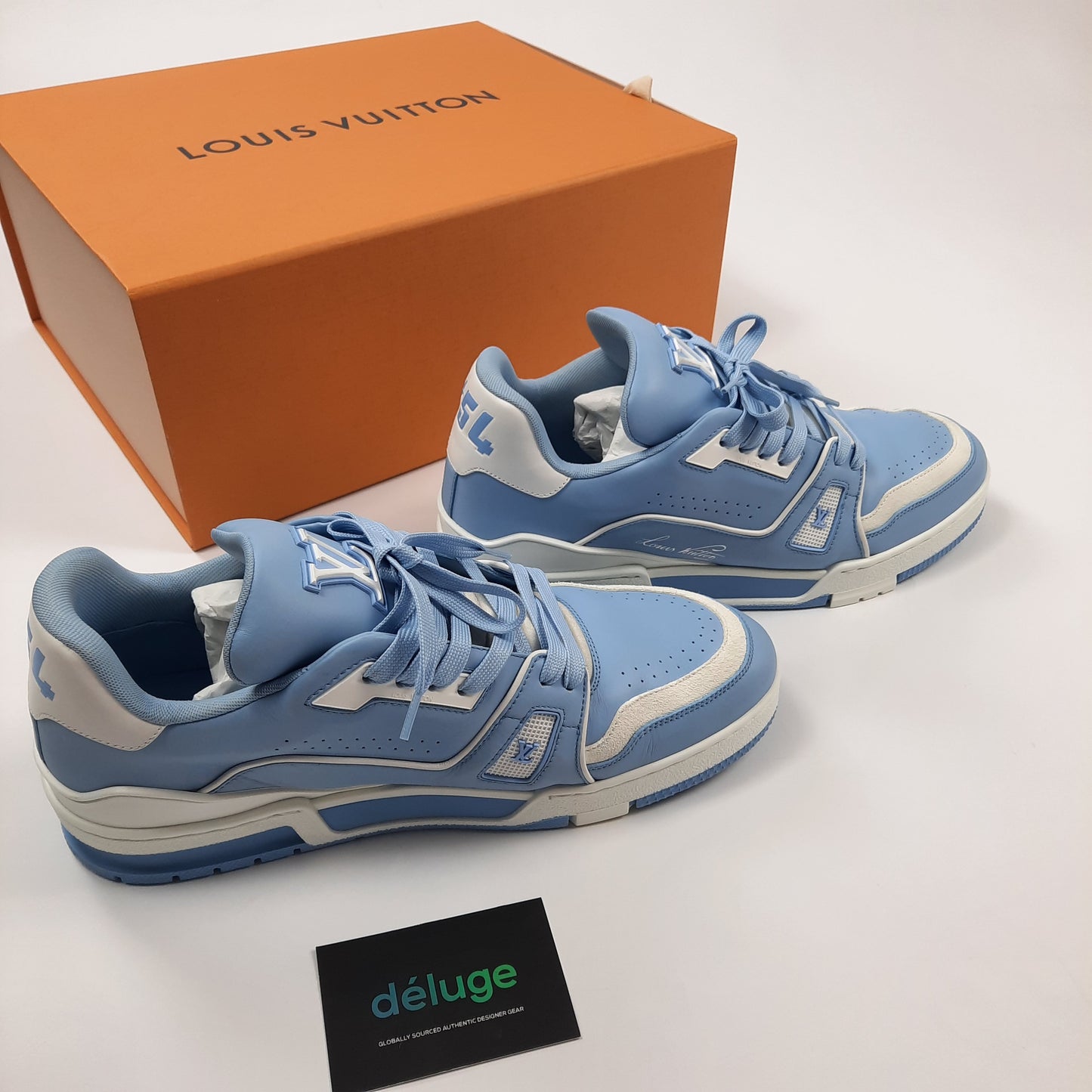 Louis Vuitton Trainer sneakers in luxury blue colorway with orange box and authentication card, men's size 8 designer shoes