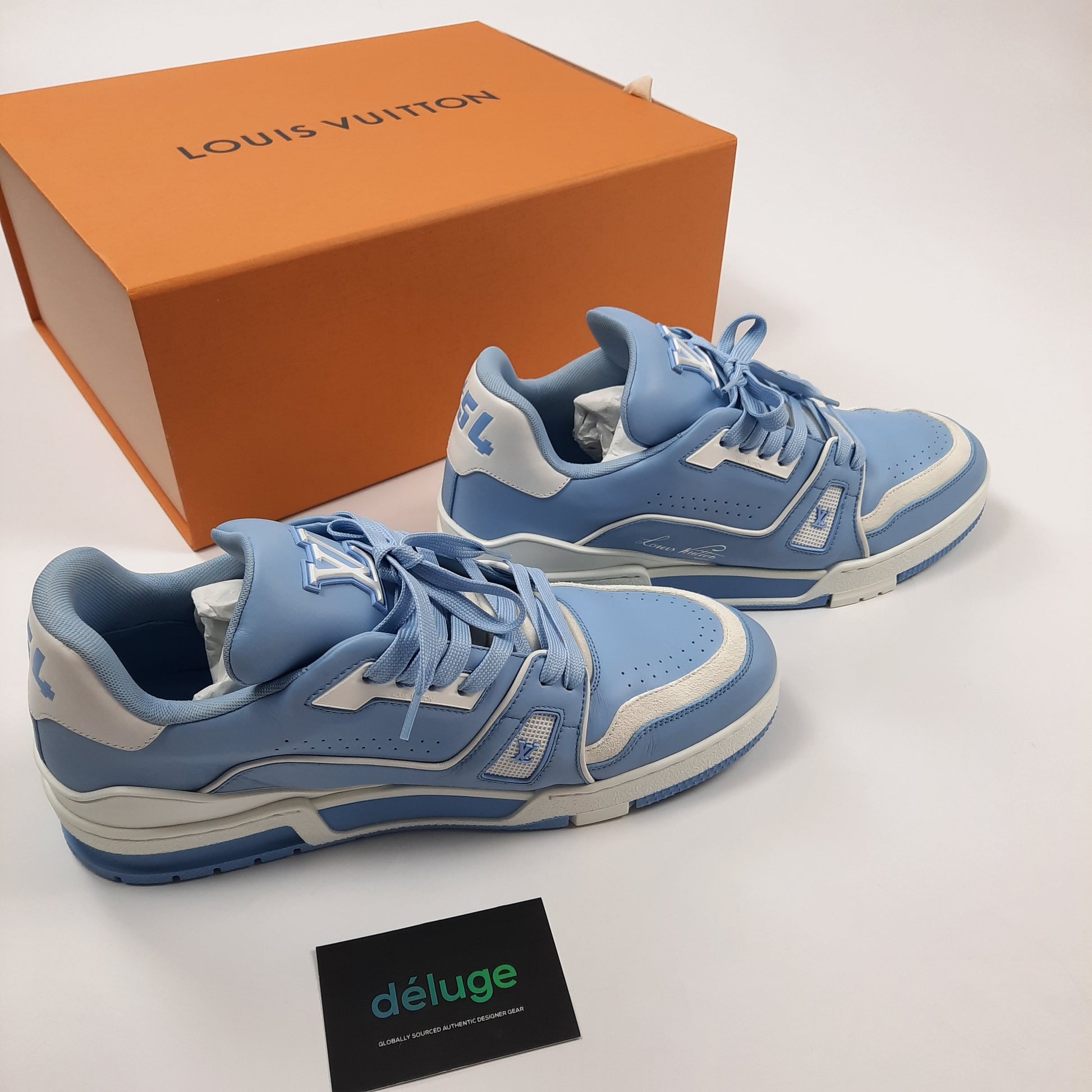 Louis Vuitton Trainer sneakers in luxury blue colorway with orange box and authentication card, men's size 8 designer shoes