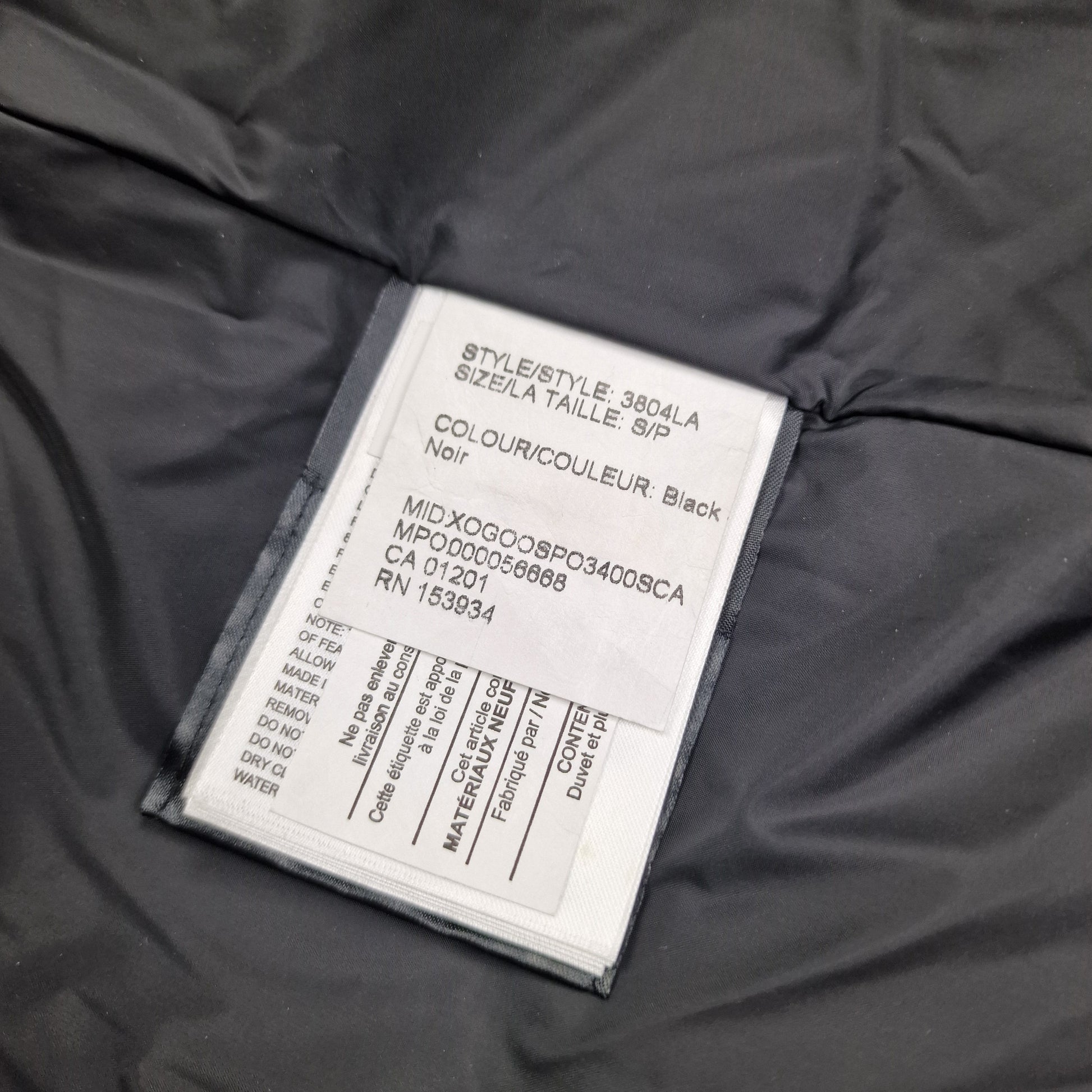 Canada Goose Chelsea Parka White Wash Tag Close-Up with Size Model and Color Code Details