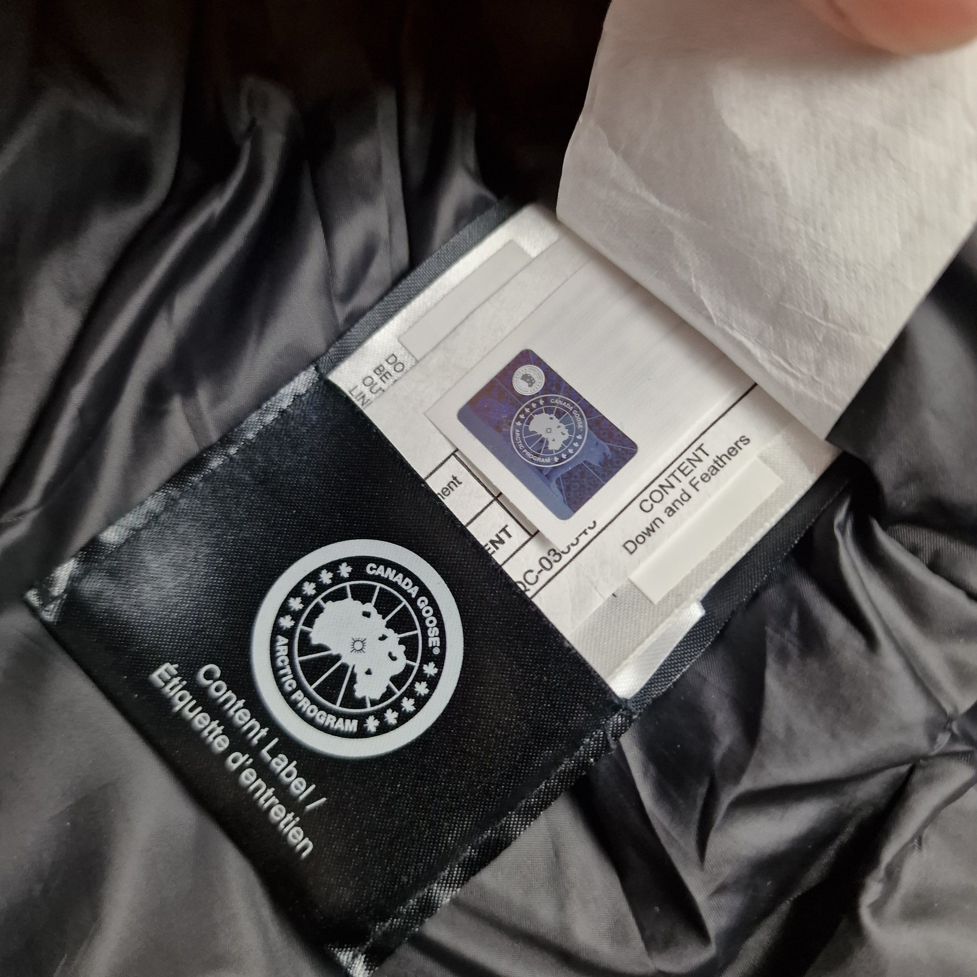 Canada Goose Authenticity Hologram Tag Close-Up on Maitland Parka Black Label
