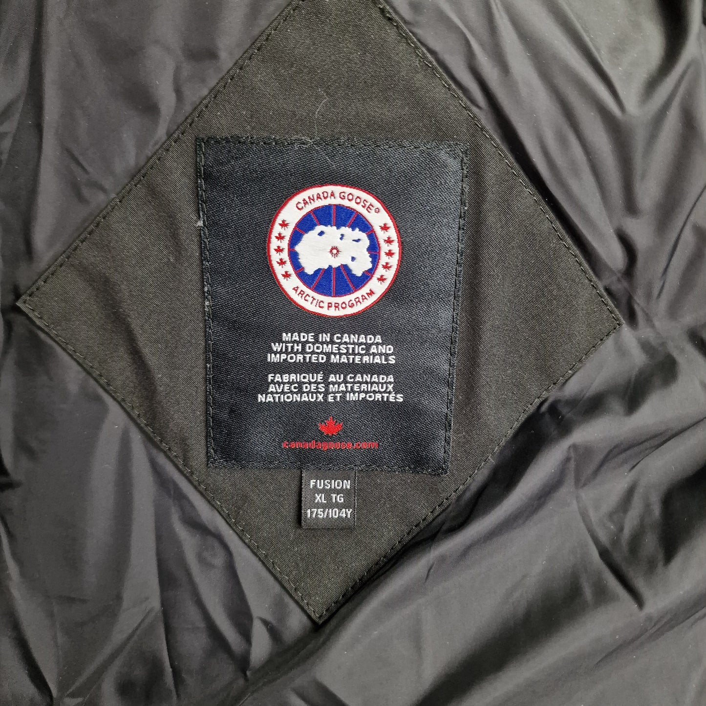 Canada Goose Wyndham Parka Neck Tag Close-Up Showing Size Label