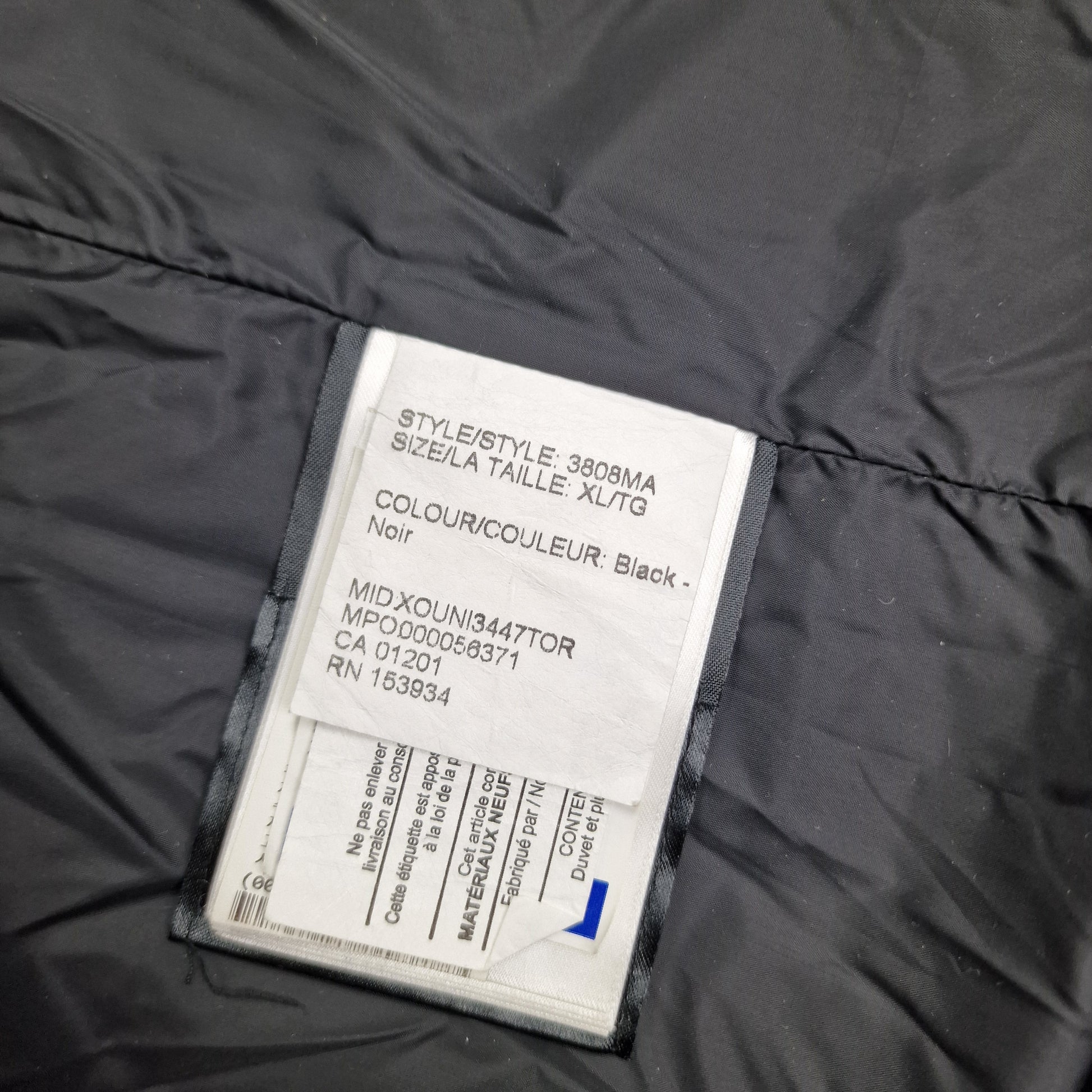 Canada Goose Wyndham Parka White Wash Tag Close-Up with Size Color and Style Code Details