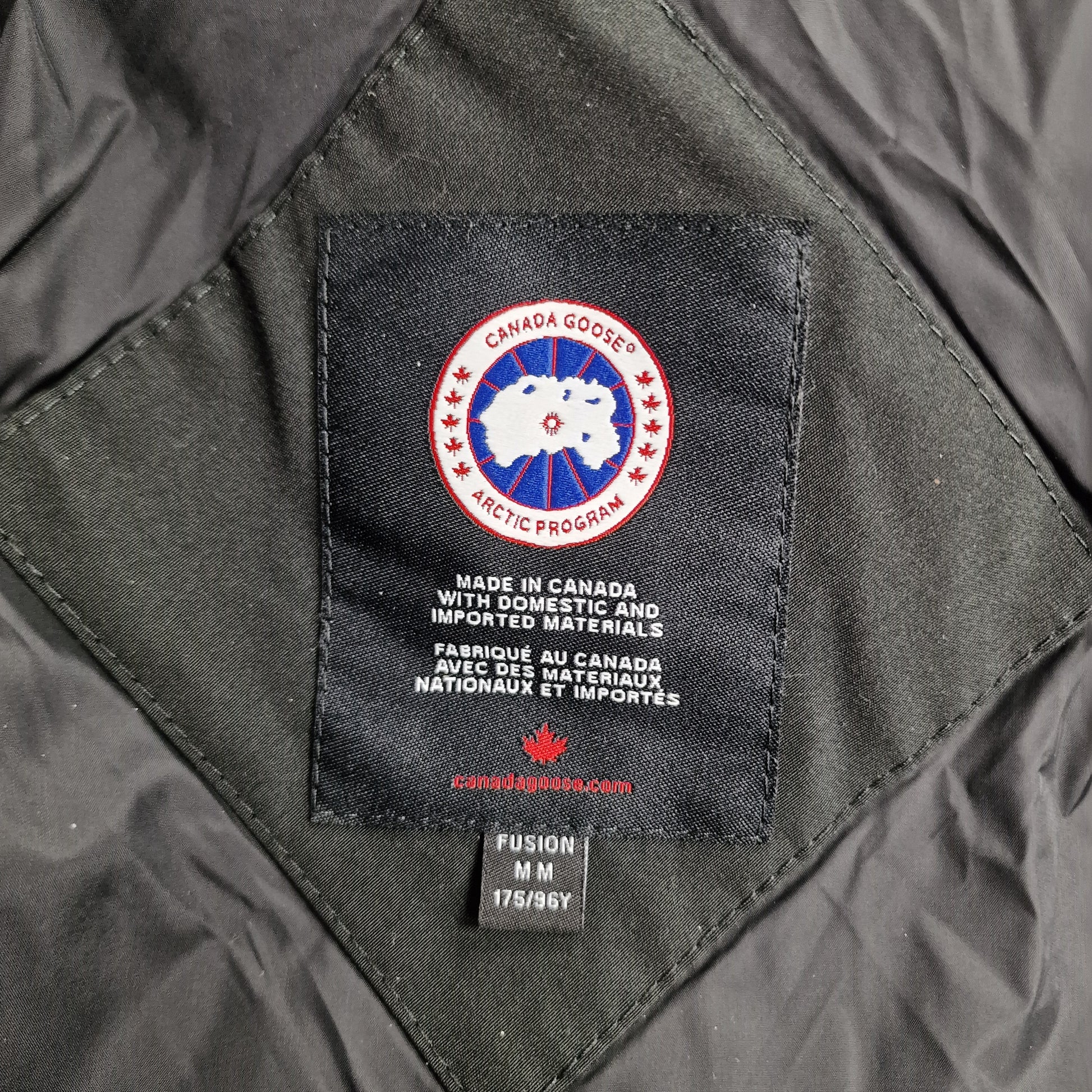 Canada Goose Wyndham Parka Heritage Neck Tag Close-Up Showing Size Label