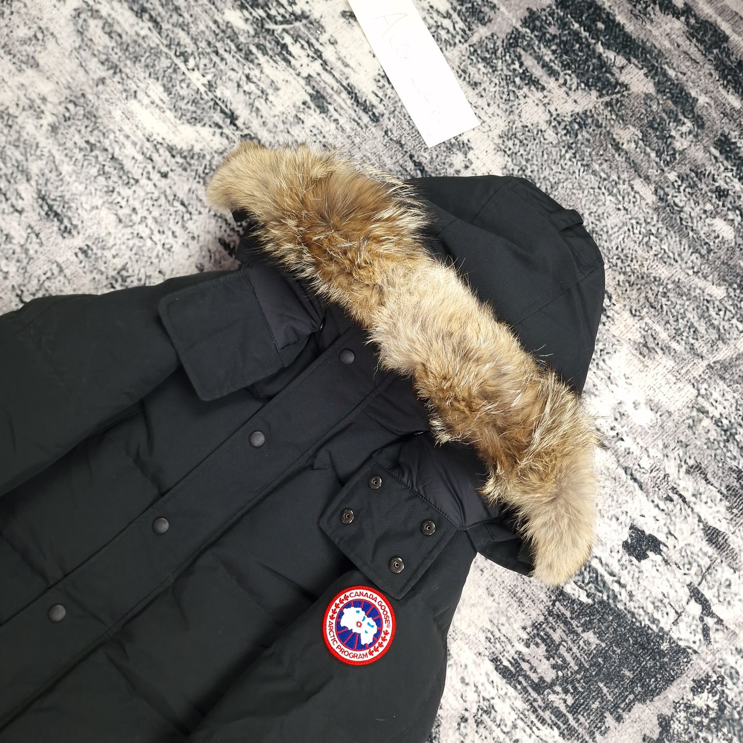 Canada Goose Wyndham Parka Heritage Black Men's Side View Showing Fur Hood and Badge Detail