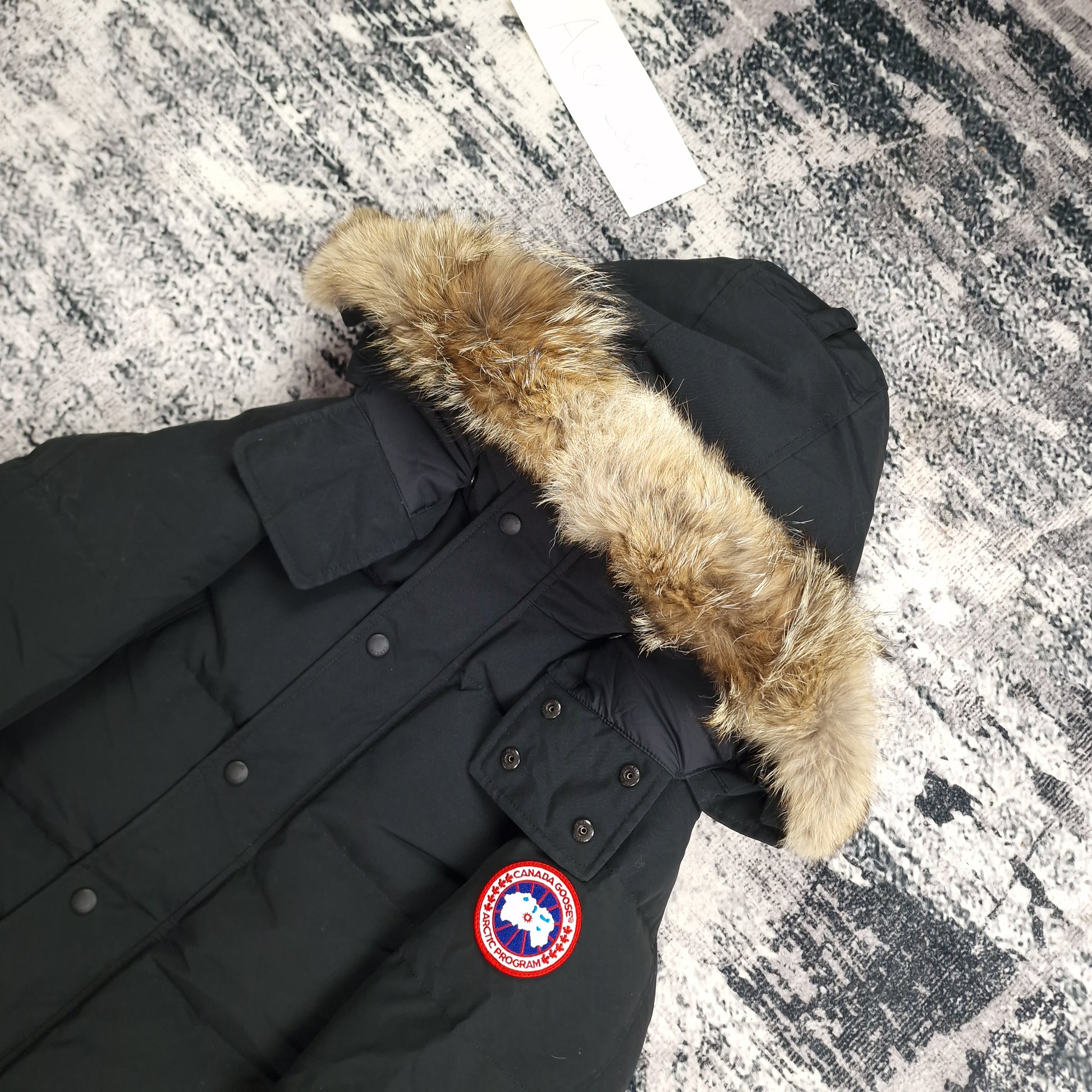 Canada Goose Wyndham Parka Heritage Black Men's Side View Showing Fur Hood and Badge Detail