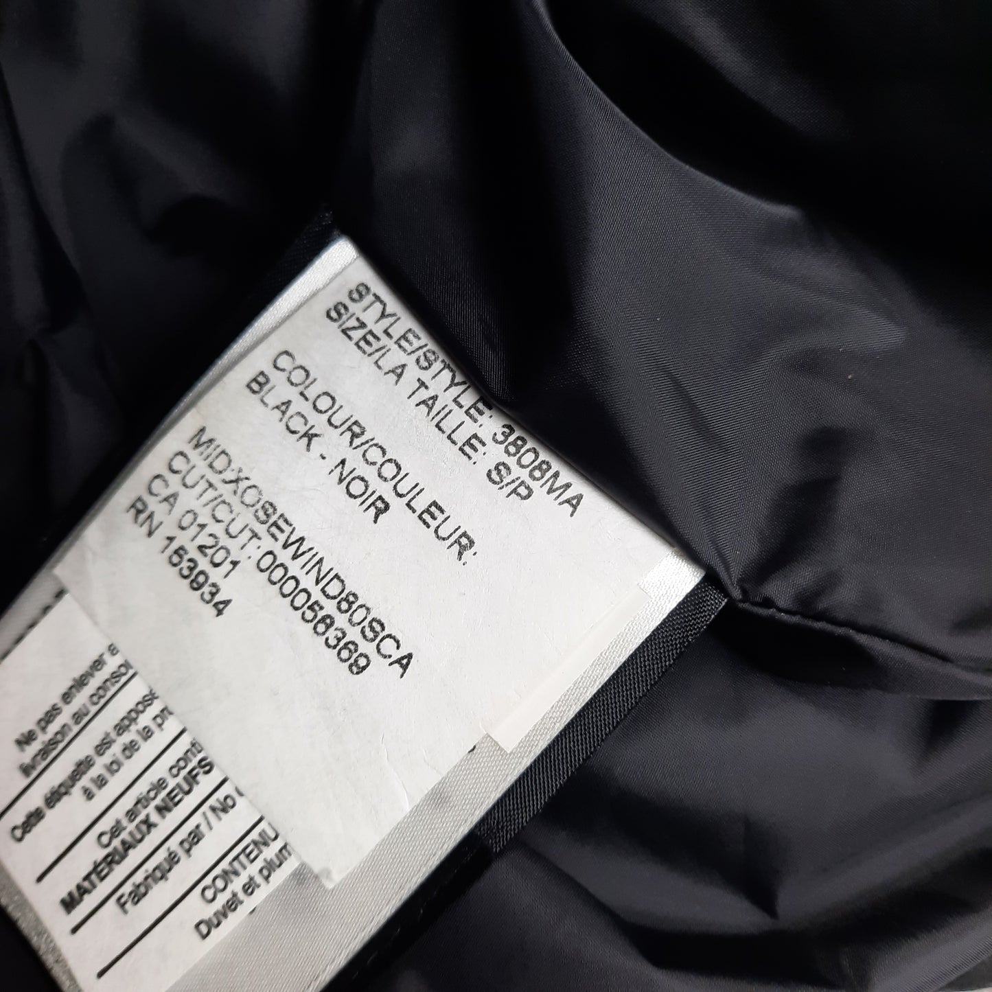 Canada Goose Wyndham Parka Heritage White Wash Tag Close-Up with Size Color and Style Code Details