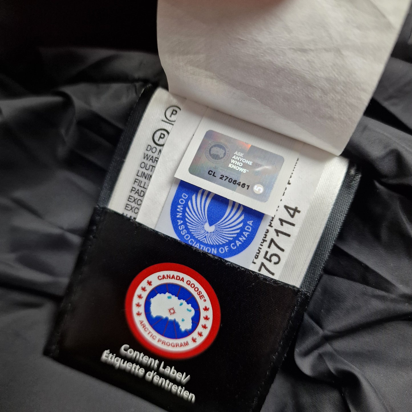 Canada Goose Authenticity Hologram Tag Close-Up on Wyndham Parka Heritage