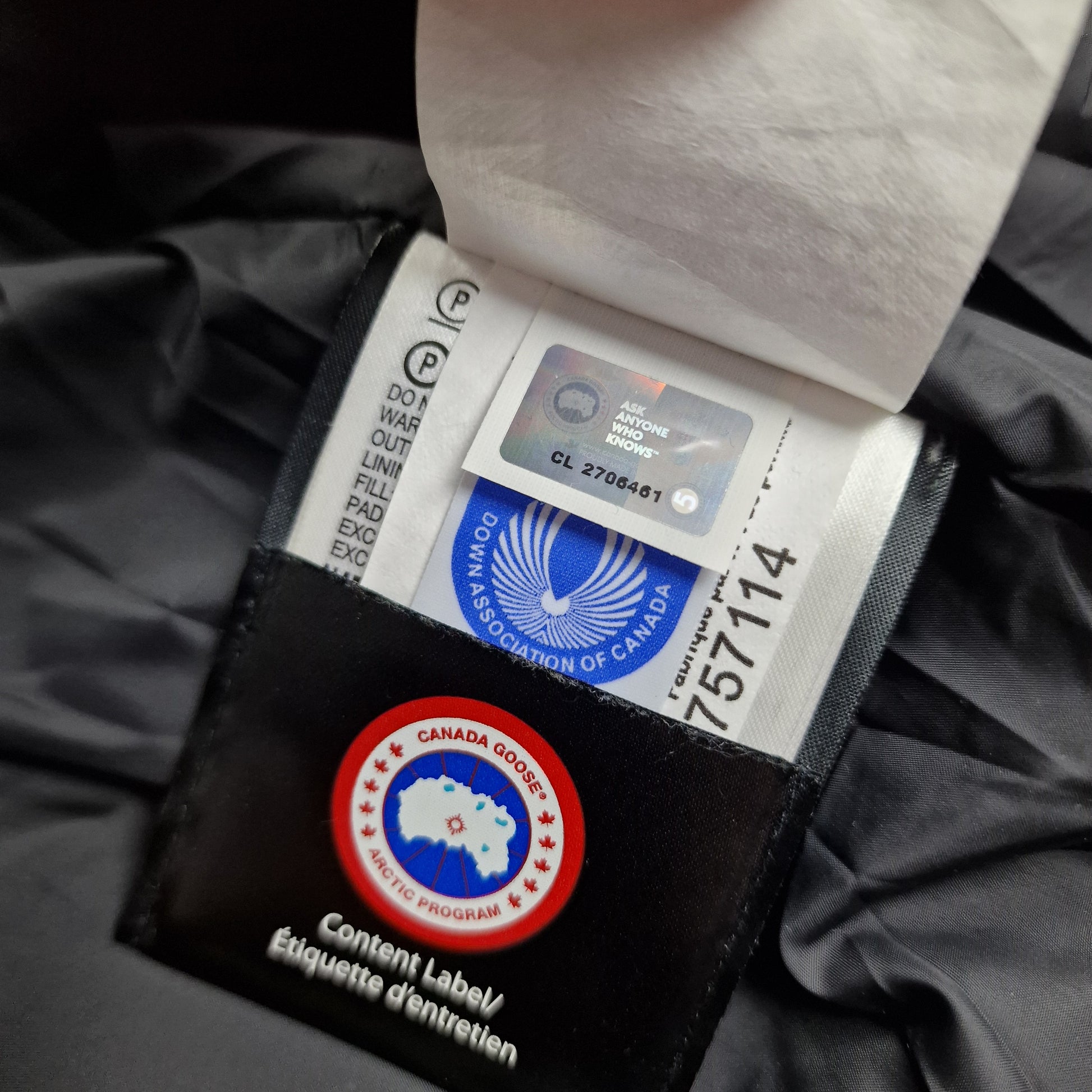 Canada Goose Authenticity Hologram Tag Close-Up on Wyndham Parka Heritage