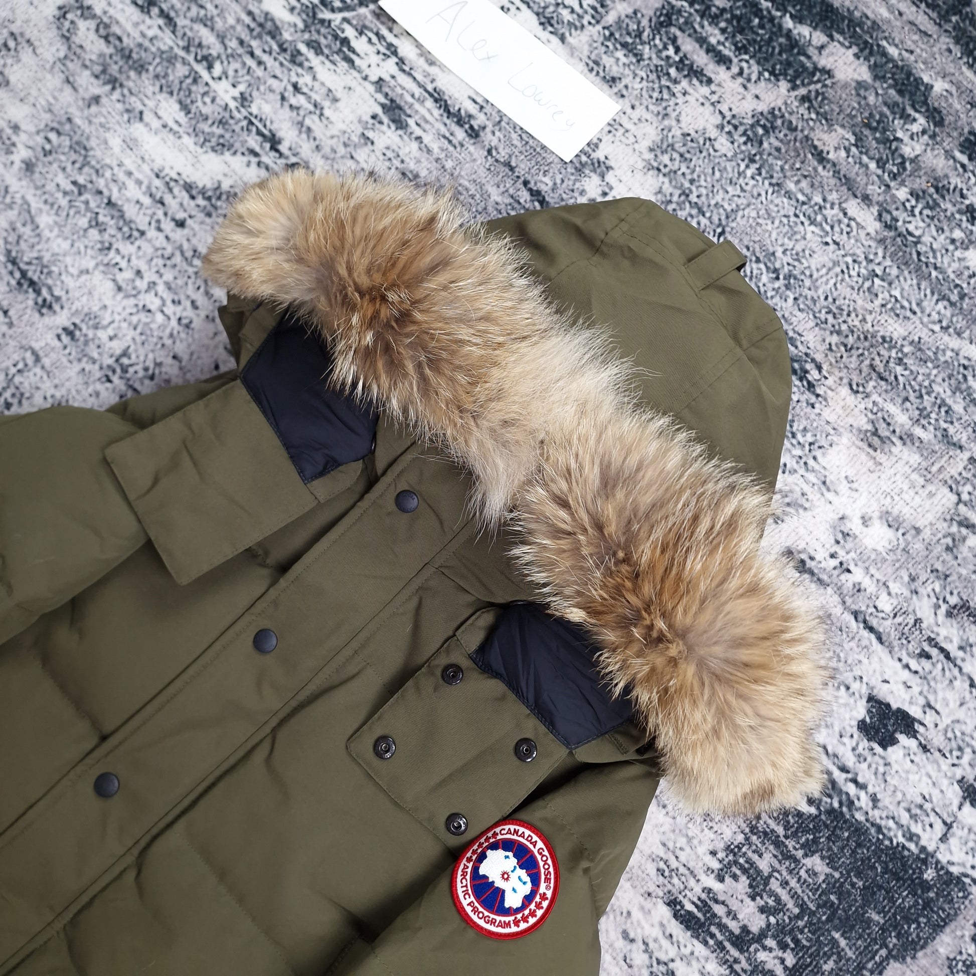 Canada Goose Wyndham Parka Heritage Military Green Men's Side View Showing Fur Hood and Badge Detail