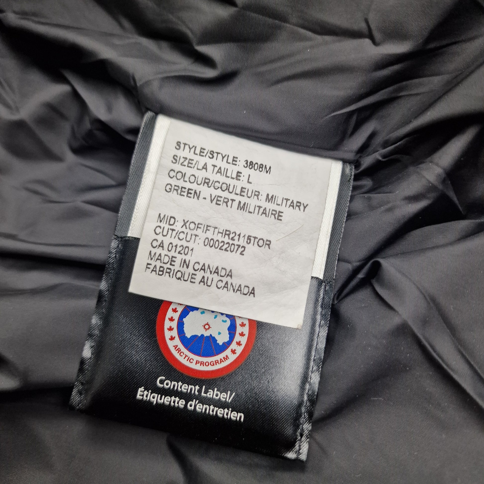 Canada Goose Wyndham Parka Heritage White Wash Tag Close-Up with Size Color and Style Code Details